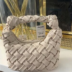 Cream Shoulder Bag with Woven Design and Curved Shape